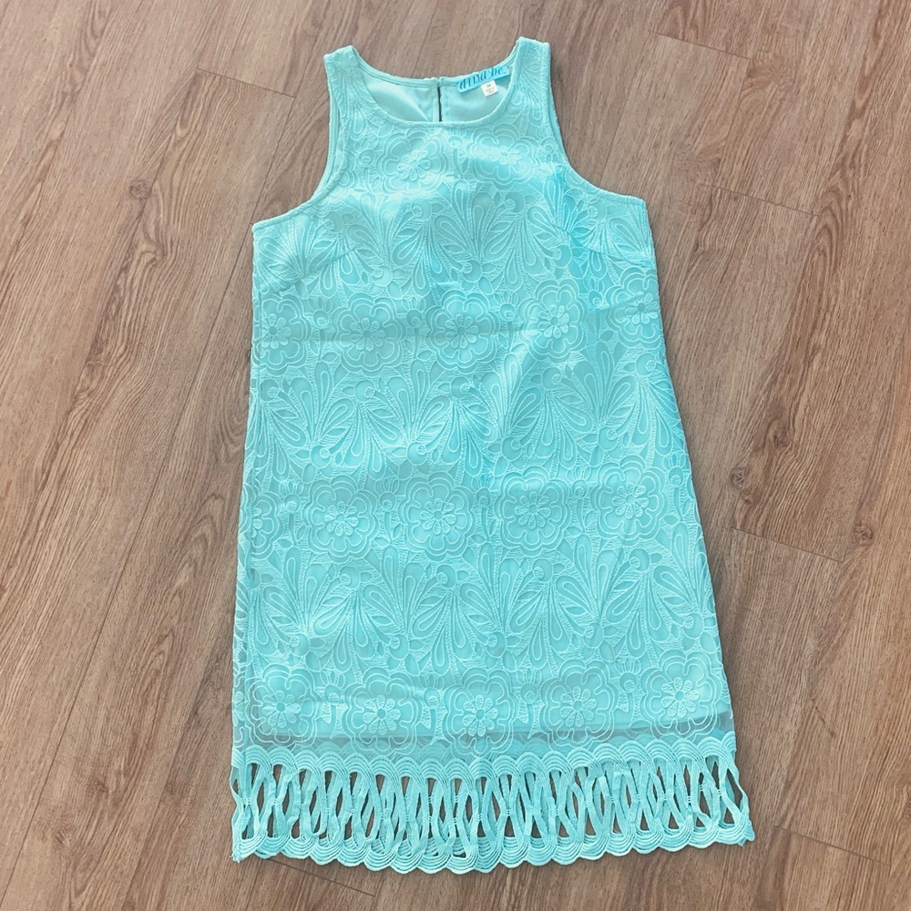 Mint green dress.